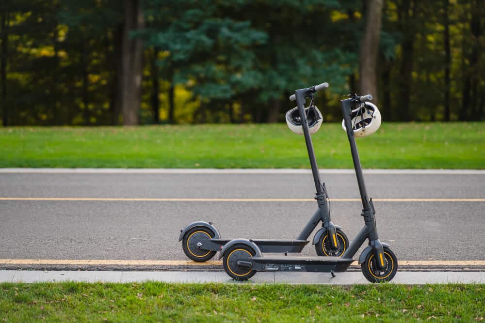 two electric kick scooters e scooter parked sidelines road 1